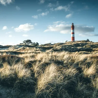 Dünenlandschaft mit Leuchtturm